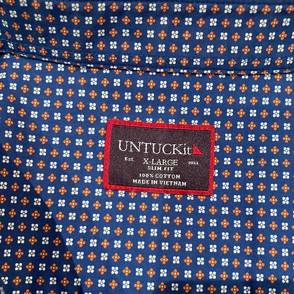UNTICKit button down slim fit dress shirt.